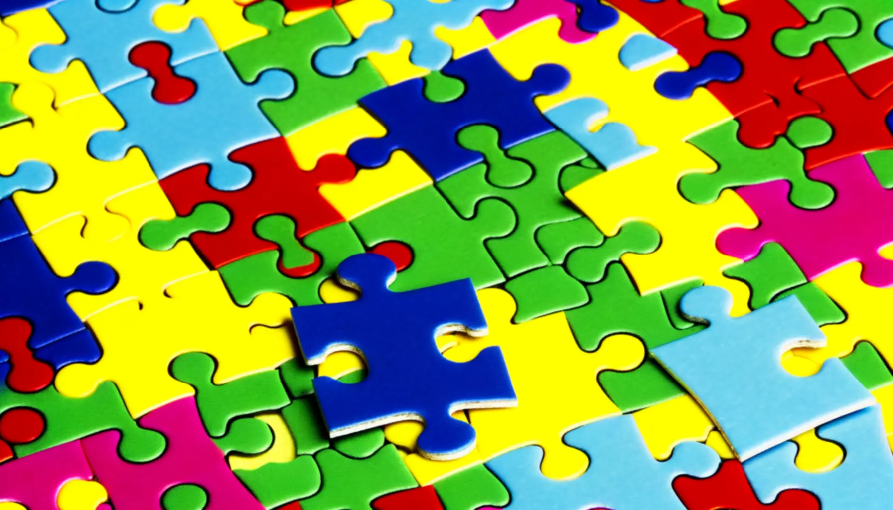 Kolorowe tło z elementami puzzli